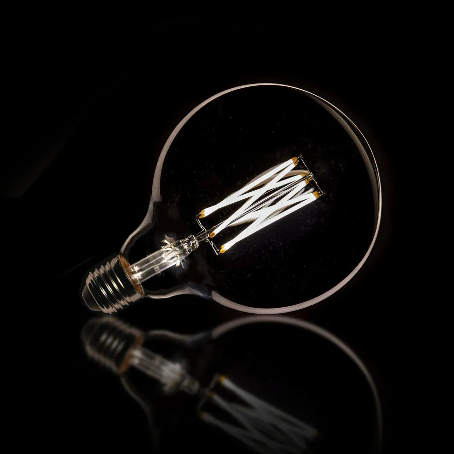 WoonStijl Lichtbron LED filament bol Ø12 5 - E27 6W 2100K 450lm dimbaar / Smoke grey glas Best